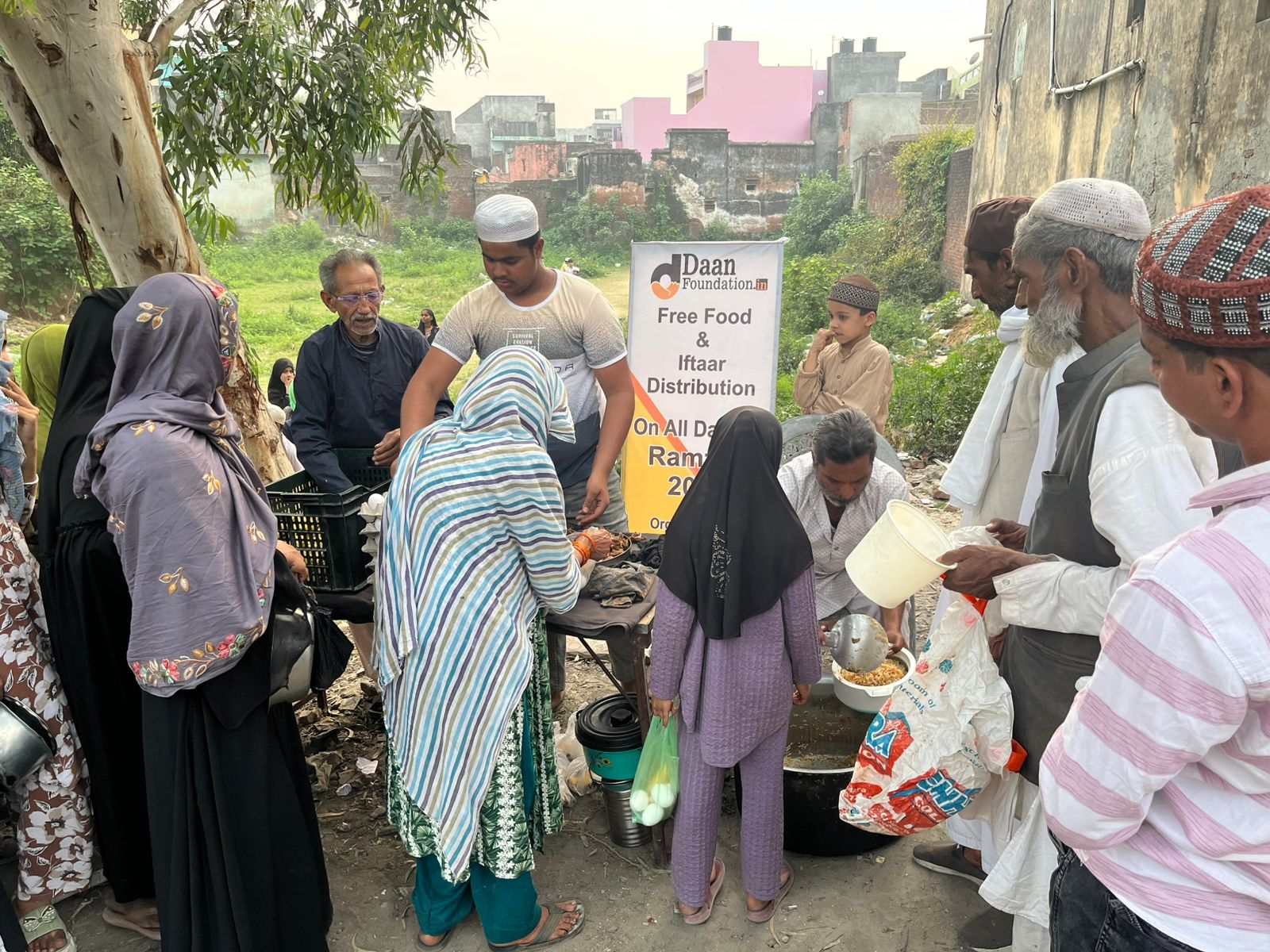 Zakat distribution community kitchen meal service in Amroha, India